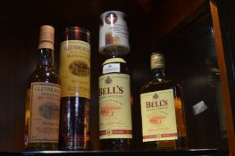 One and Half Bottles of Bells 8 Year Old Extra Special Scotch Whisky Plus 1/2 Bottle of Glenmorangie