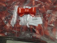 *Five Boxes of Red Plastic Bow Brooches