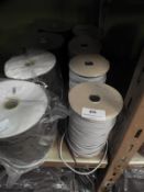 *Four Rolls of Grey Elastic Cord