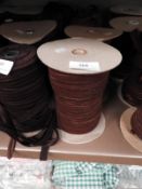 *Four Rolls of Brown Elasticated Ribbon