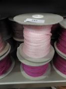 *Four Assorted Rolls of Pink Braid Edging