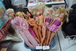 Basket of Barbie Dolls etc.