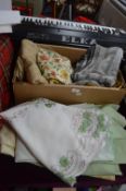 Box and a Quantity of Embroidered Tablecloths