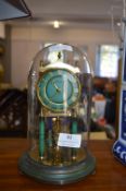Green & Gilt Skeleton Clock in Glass Dome