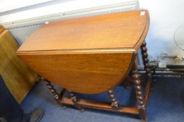 Oval Oak Drop Leaf Barley Twist Dining Table