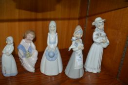 Four Pottery Figurines