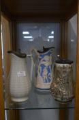 Three Pottery Jugs with Pewter Lids