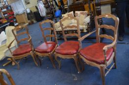 Four Red Upholstered Dining Chairs
