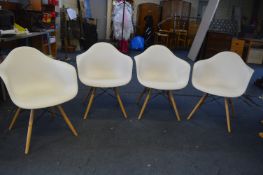 Four Moulded Chairs on Beech Legs