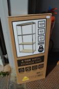 Four Tier Metal Storage Unit in Original Packaging