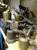 Seven Brass Blow Lamps