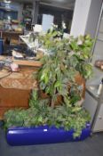 Blue Planter Containing Artificial Plants