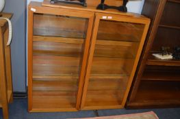 Wall Mounted Glazed Cabinets and a Shelf