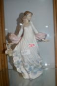 Lladro Figure of a Girl with Flowers