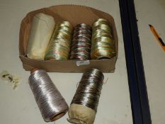 *Six Rolls of Iridescent Thread