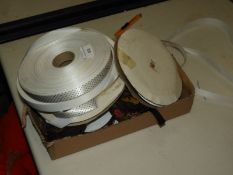 *Thirteen Rolls of Assorted Ribbons, etc.