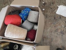 *Box Containing Mixed Cones of Wool