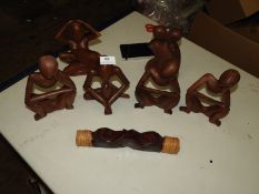 *Seven Carved Wood Figures