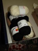 *Six Rolls of Knitting Yarn (2x Cream, 4x Black)