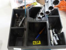 Storage Tray with a Quantity of Sockets