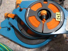 Three Black & Decker Hose Reels