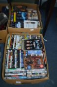 Two Boxes of DVDs (100+)