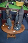 Oval Side Table with Four Metal African Figures
