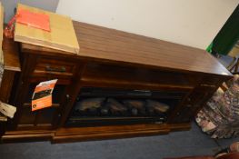 *TV Console and Fireplace