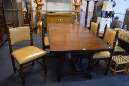 Dark Oak Dining Table with Four Cream Upholstered