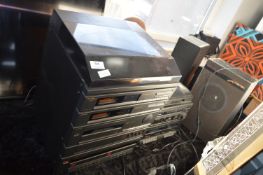 Five Assorted Music Systems and a Pair of Speakers