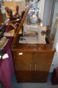 Singer Sewing Machine in Mahogany Cabinet