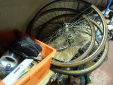 Shelf of Bicycle Wheels, Racks and a Box of Car Pa