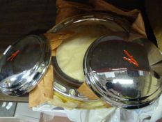Two Astin Hubcaps and Four Chrome Wheel Trims
