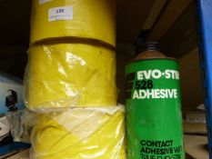 Three Large Rolls of Adhesive Tape and a Part Used