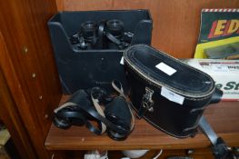 Two pairs of Binoculars - One Tasco and One Omega