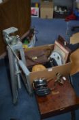 Box of Assorted Items Including Cameras, Tripods,