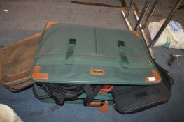 Green Suitcase and a Quantity of Smaller Bags