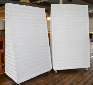 A Pair Of Double-Sided Mobile Slatwall Display Units On Castors - Dimensions: H212 x W125 x D73cm