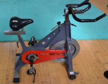 1 x TRUE Indoor Cycling Spin Bike With Adjustable Bars and Seat - Dimensions: L100cm x H100cm