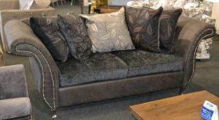 1 x Stylish Bespoke Triple Seater Sofa. This sofa is covered in a soft dark grey leatherette with th