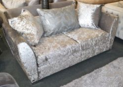 1 x Extravagant Silver Crushed Velvet Triple Seater Sofa. This eye catching piece would bring bright