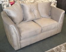 1 x Elegant Double Seater Sliver Plush Velvet Sofa. This eye catching piece would bring bright a col