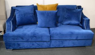 1 x Triple Seater Sapphire Blue Plush Velvet Sofa. This sofa gives the customer fresh and modern loo