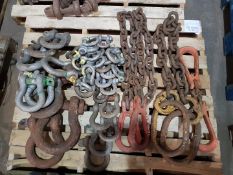 pallet of various shackles and chain slings