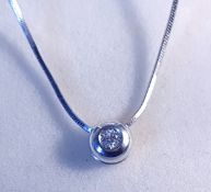 18kt Gold 0.33ct Diamond necklace and Pendant (4.5grams)