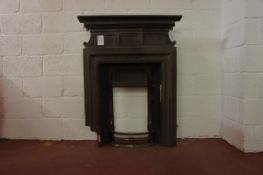 Cast iron fireplace insert with tile inserts