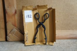 A pair of coal tongs