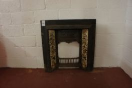 Cast iron fireplace insert with tile inserts
