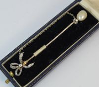 Gold Pin Brooch set with a Pearl and Multiple Diamonds
