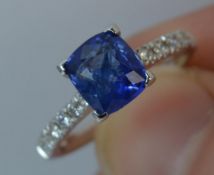 Sapphire and Diamond Cluster ring in 18ct Gold
